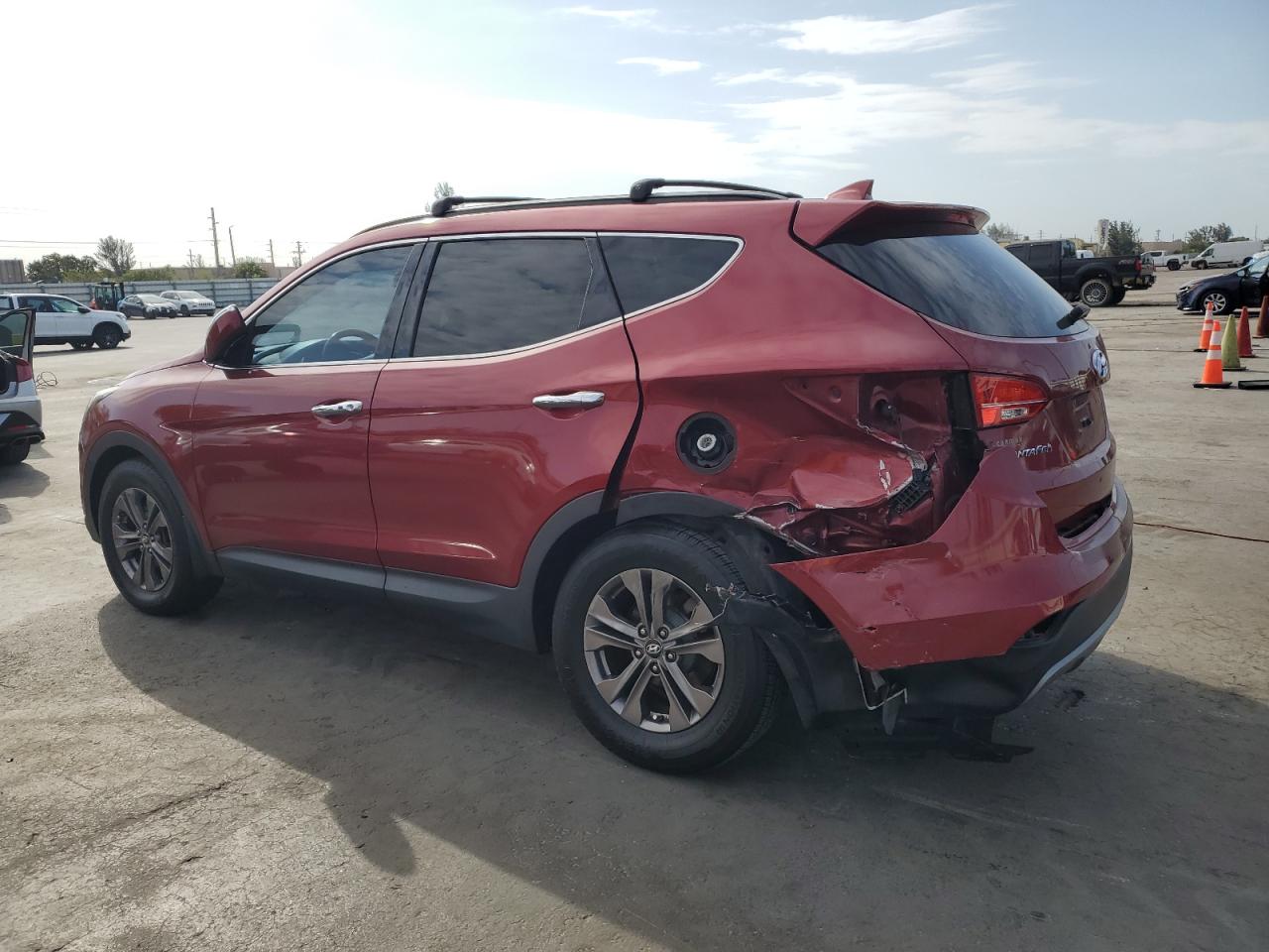 2015 Hyundai Santa Fe VIN 5XYZU3LB6FG240215 Copart auction photo, rear end damage thumbnail 2