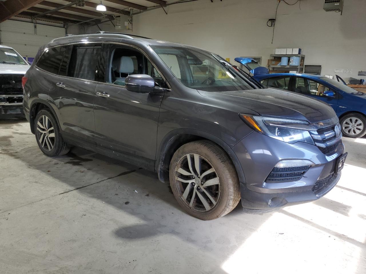 2016 Honda Pilot VIN 5FNYF6H02GB059023 Copart auction photo, water/flood damage thumbnail 4