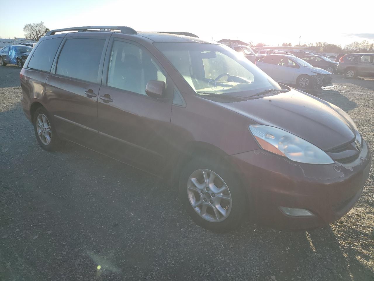 2006 Toyota Sienna VIN 5TDZA22C66S561591 Copart auction photo, minor dent/scratches damage thumbnail 4