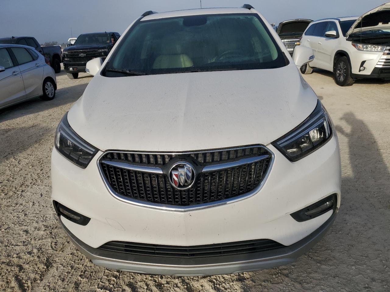 2018 Buick Encore VIN KL4CJCSB3JB561965 Copart auction photo, water/flood damage thumbnail 5