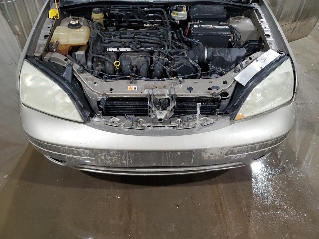2005 Ford Focus VIN 1FAFP34N55W217776 Copart auction photo, rear end damage thumbnail 11