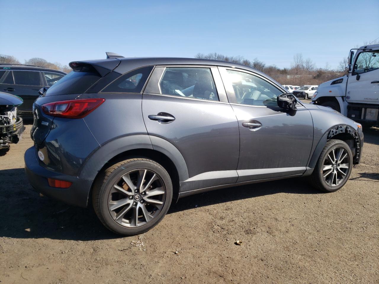 2017 Mazda CX-3 VIN JM1DKFC79H0163216 Copart auction photo, undercarriage / minor dent/scratches damage thumbnail 3