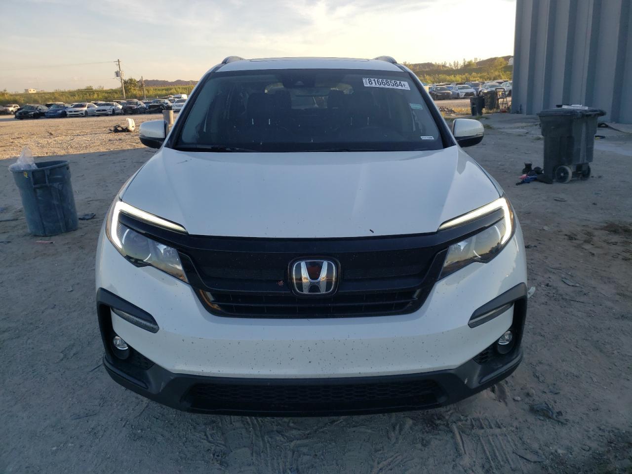 2021 Honda Pilot VIN 5FNYF5H25MB029358 Copart auction photo, front end / minor dent/scratches damage thumbnail 5