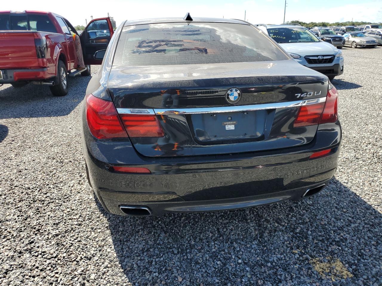 2015 BMW 7er VIN WBAYE4C55FD947410 Copart auction photo, water/flood damage thumbnail 6