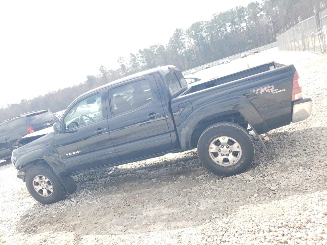 2011 Toyota Tacoma VIN 5TFJU4GN7BX010830 Copart auction photo, front end / minor dent/scratches damage thumbnail 2