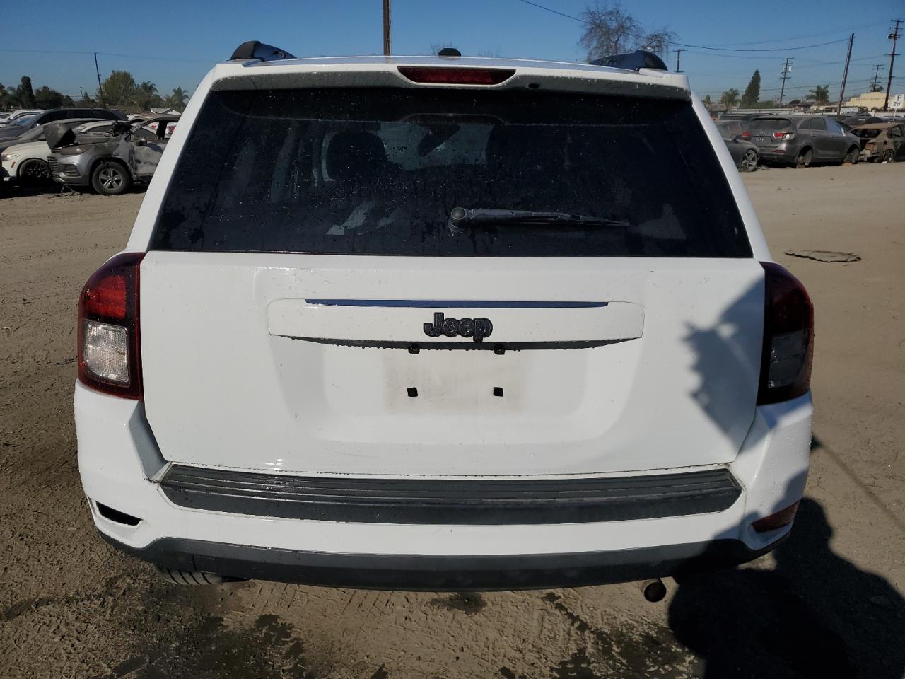 2016 Jeep Compass VIN 1C4NJCBA0GD641582 Copart auction photo, front end / rear end damage thumbnail 6