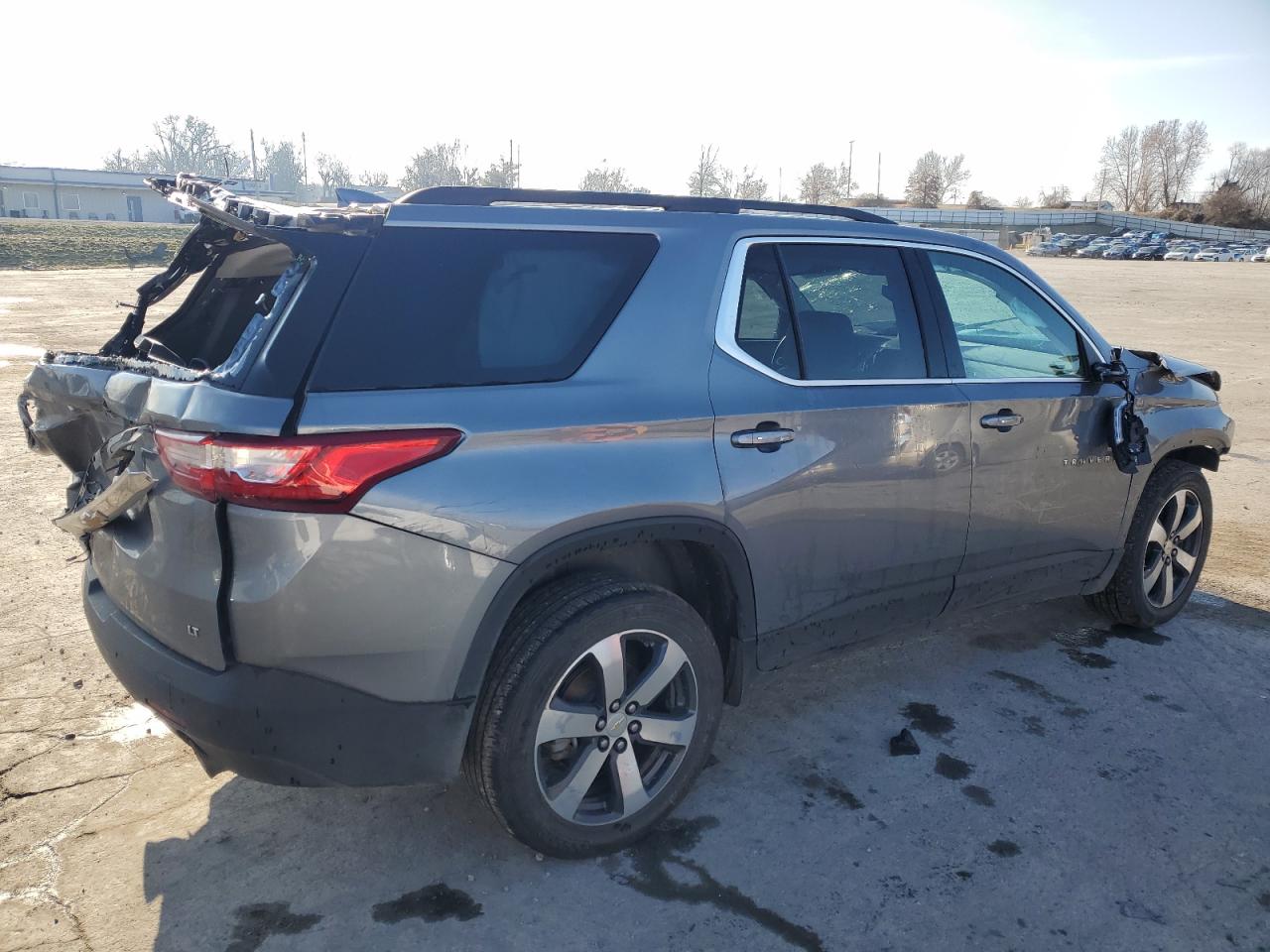 2021 Chevrolet Traverse VIN 1GNEVHKW5MJ215727 Copart auction photo, all over damage thumbnail 3