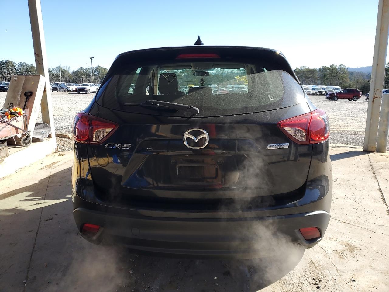2016 Mazda CX-5 VIN JM3KE2BY0G0635634 Copart auction photo, front end / side damage thumbnail 6