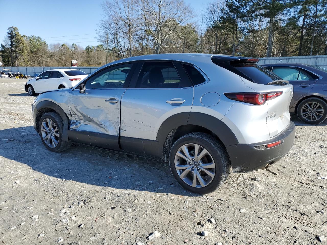 2021 Mazda CX-30 VIN 3MVDMABL5MM237202 Copart auction photo, side / front end damage thumbnail 2