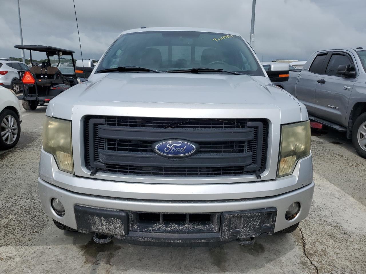 2014 Ford F-150 VIN 1FTFX1ET3EFC89961 Copart auction photo, water/flood damage thumbnail 5