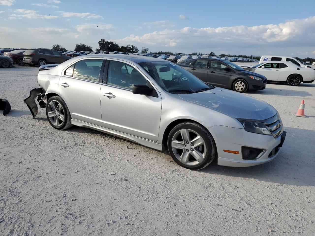 2011 Ford Fusion VIN 3FAHP0KC6BR102630 Copart auction photo, rear end / minor dent/scratches damage thumbnail 4