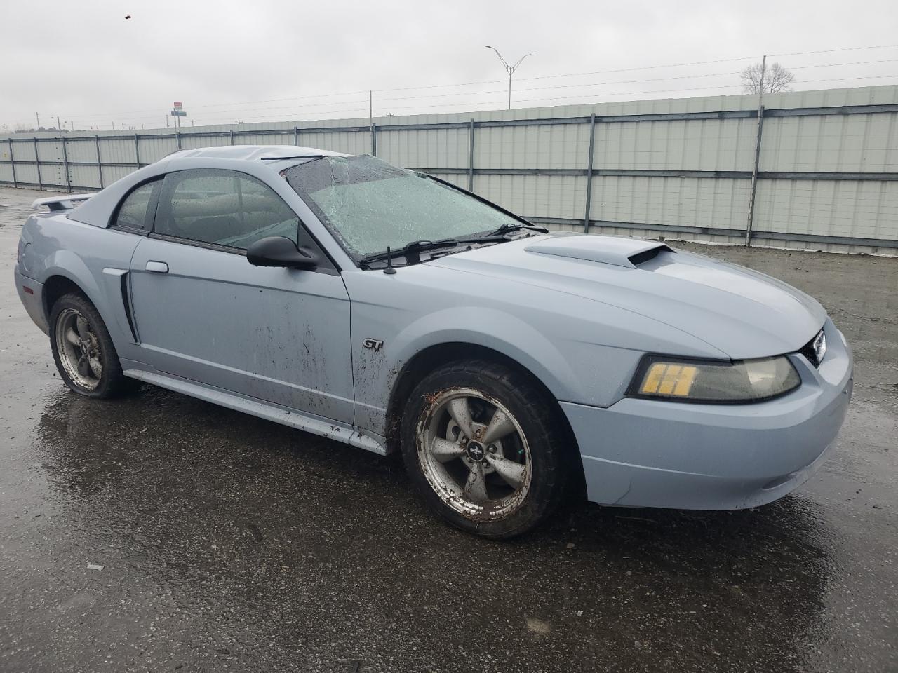 2002 Ford Mustang VIN 1FAFP42X92F128038 Copart auction photo, all over / rollover damage thumbnail 4