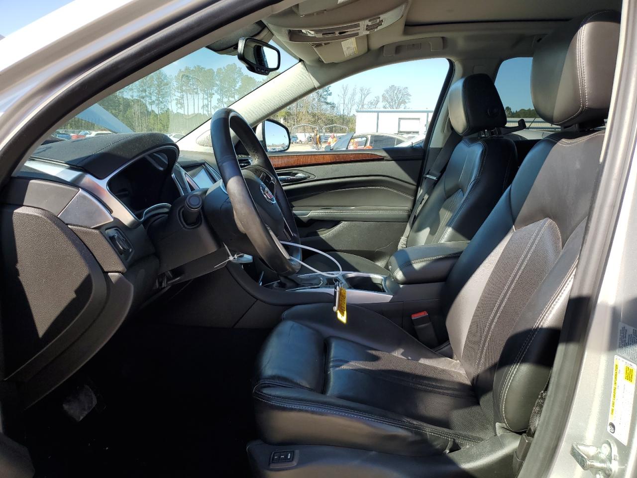 2015 Cadillac SRX VIN 3GYFNFE36FS639643 Copart auction photo, rear end damage thumbnail 7