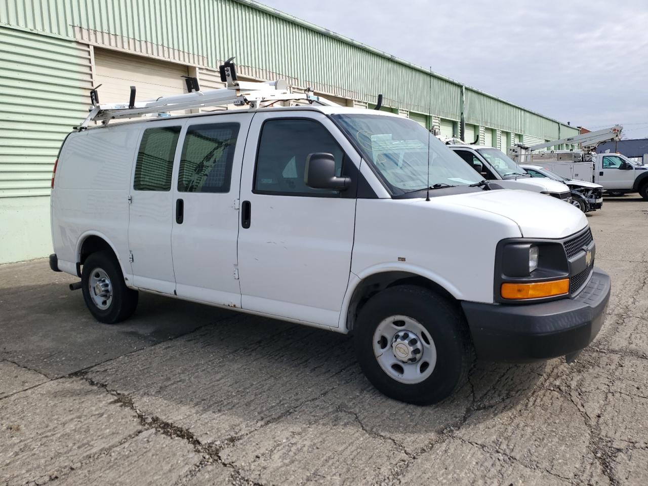 2013 Chevrolet Express VIN 1GCWGFCA3D1903689 Copart auction photo, minor dent/scratches damage thumbnail 4