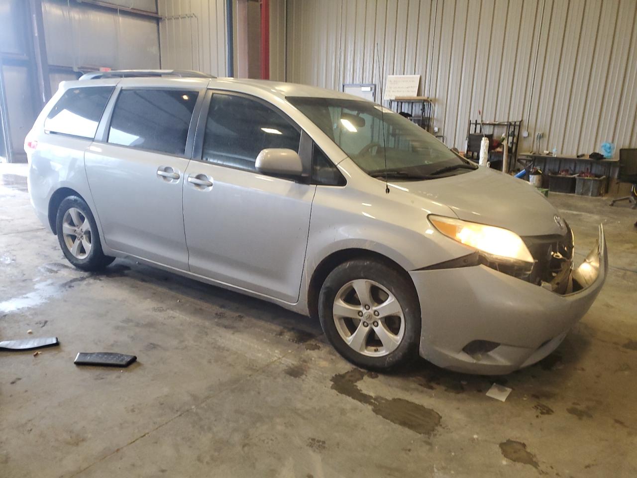 2012 Toyota Sienna VIN 5TDKK3DC8CS233182 Copart auction photo, front end damage thumbnail 4