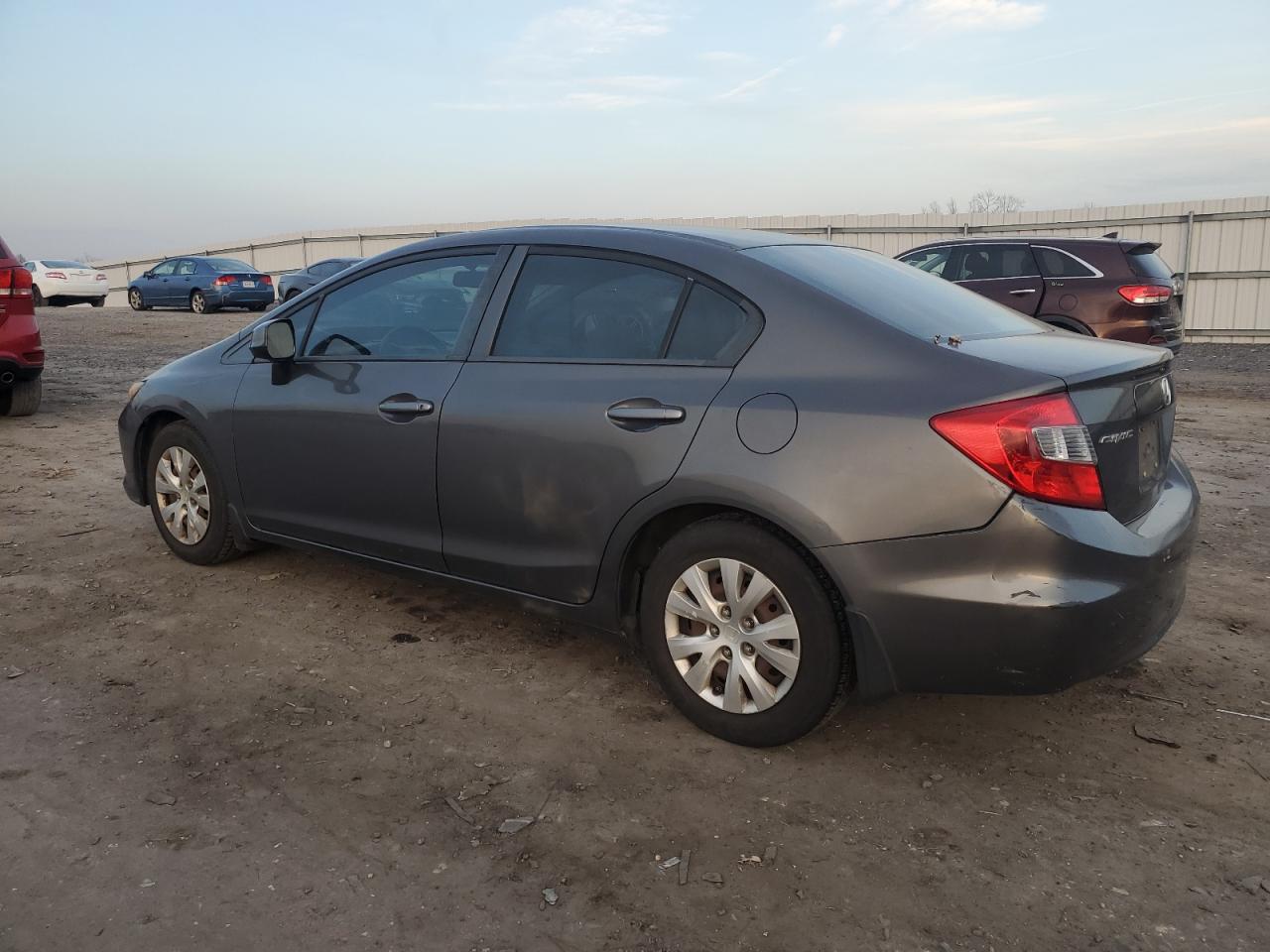 2012 Honda Civic VIN 2HGFB2F59CH586377 Copart auction photo, rear end / all over damage thumbnail 2