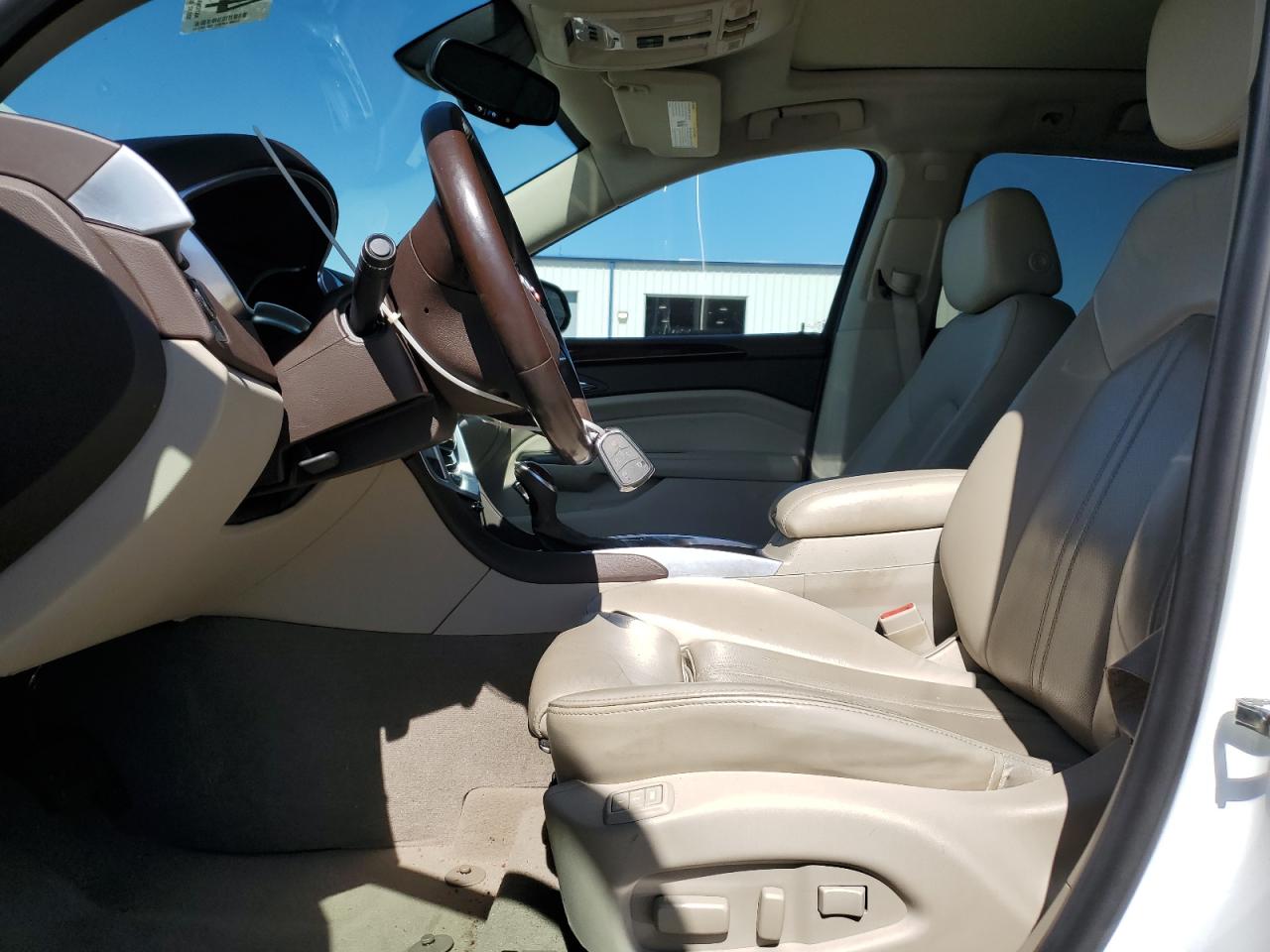 2015 Cadillac SRX VIN 3GYFNBE30FS608526 Copart auction photo, side damage thumbnail 7