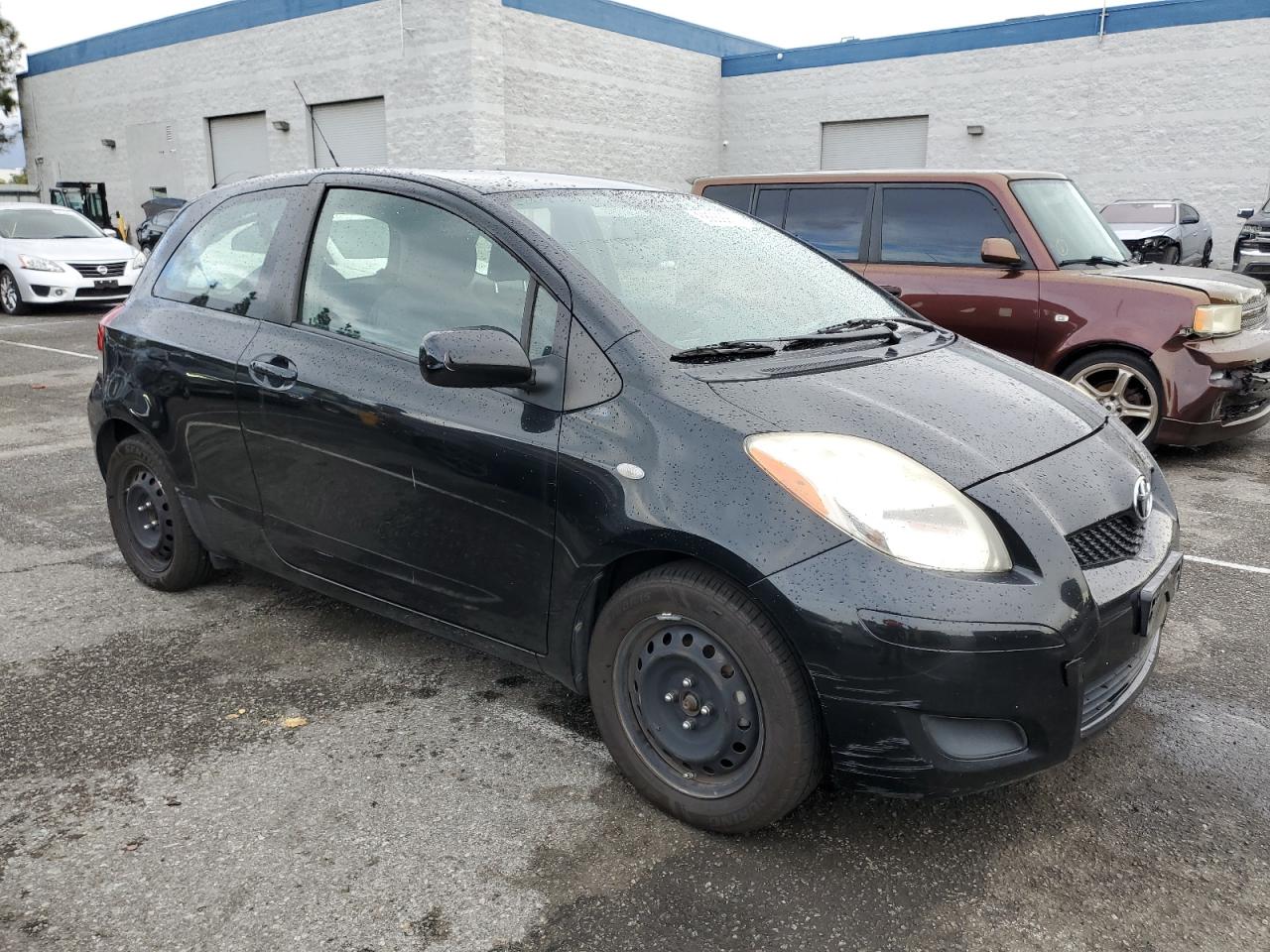 2010 Toyota Yaris VIN JTDJT4K38A5301758 Copart auction photo, rear end damage thumbnail 4