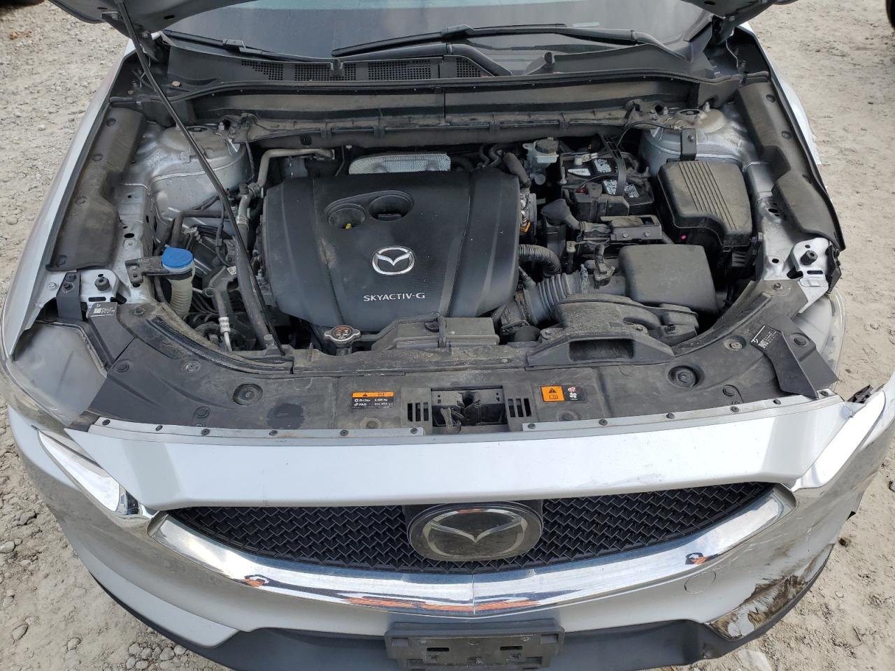 2021 Mazda CX-5 VIN JM3KFBCM6M0345869 Copart auction photo, front end / undercarriage damage thumbnail 12