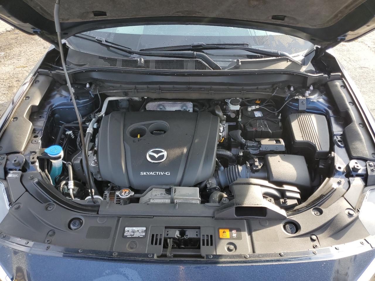 2020 Mazda CX-5 VIN JM3KFACM4L0860328 Copart auction photo, side / minor dent/scratches damage thumbnail 12