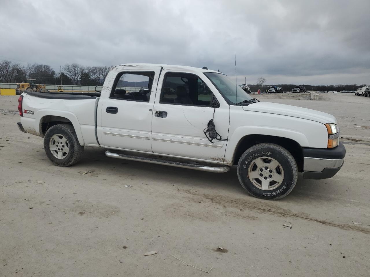 2005 Chevrolet Silverado VIN 2GCEK13TX51402311 Copart auction photo, side damage thumbnail 4