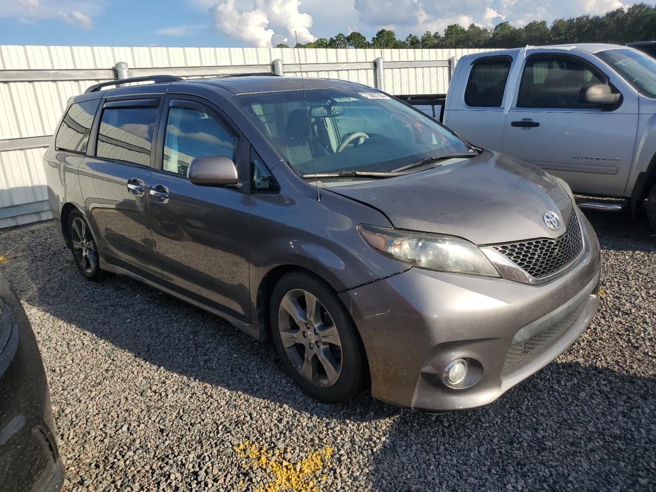 2014 Toyota Sienna VIN 5TDXK3DC8ES520160 Copart auction photo, water/flood damage thumbnail 4
