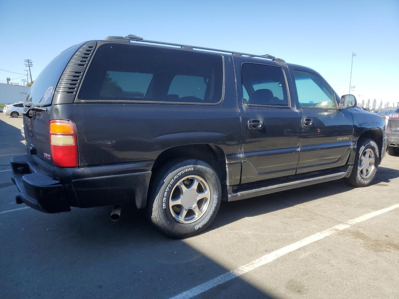 2003 GMC Yukon VIN 1GKFK66U73J291892 Copart auction photo, minor dent/scratches damage thumbnail 3