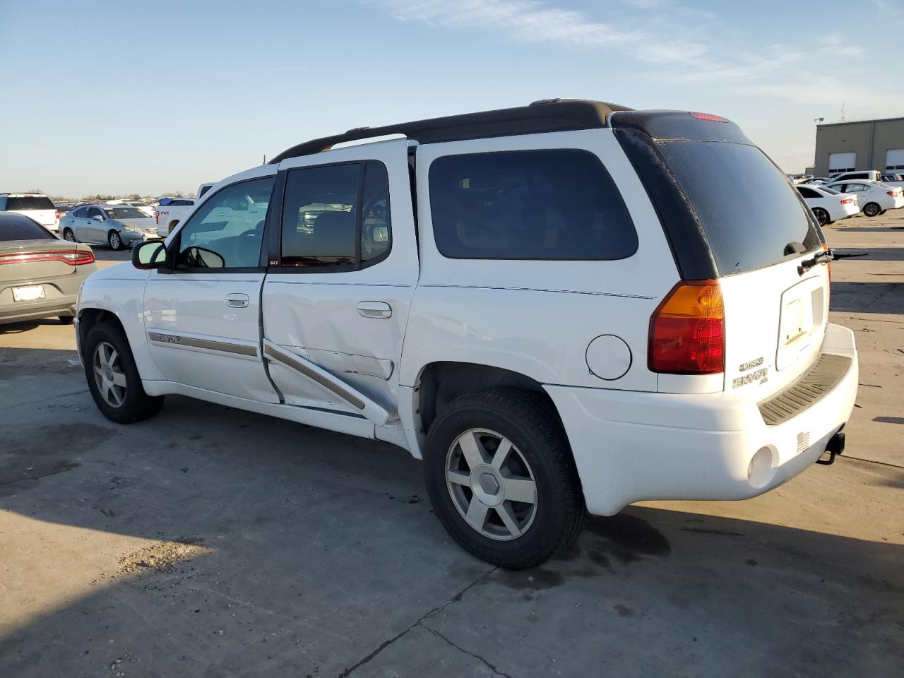 2004 GMC Envoy VIN 1GKES16S646189209 Copart auction photo, all over damage thumbnail 2