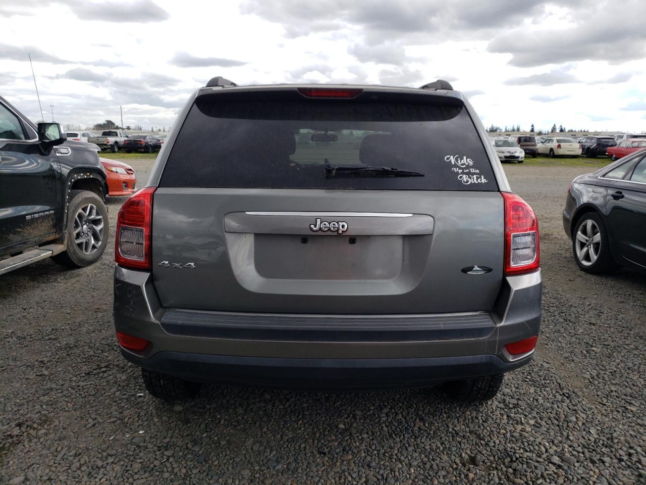 2012 Jeep Compass VIN 1C4NJDBB7CD576173 Copart auction photo, undercarriage / all over damage thumbnail 6