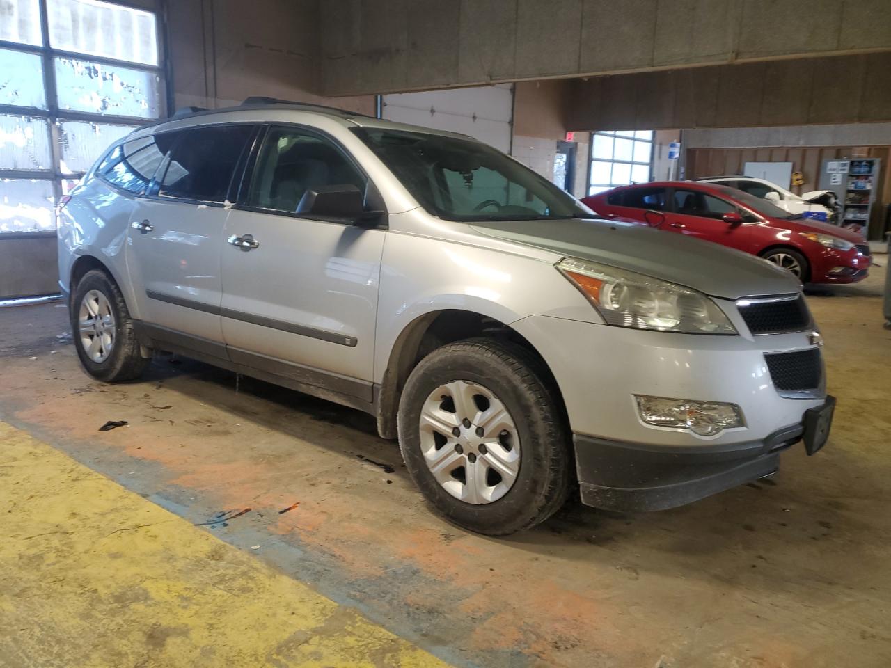 2010 Chevrolet Traverse VIN 1GNLREED7AS110715 Copart auction photo, side / undercarriage damage thumbnail 4