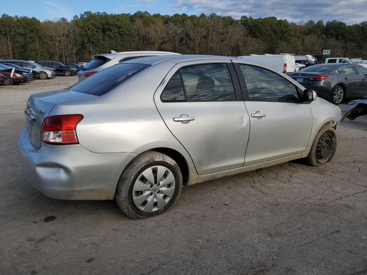 2010 Toyota Yaris VIN JTDBT4K38A4067521 Copart auction photo, front end / rear end damage thumbnail 3