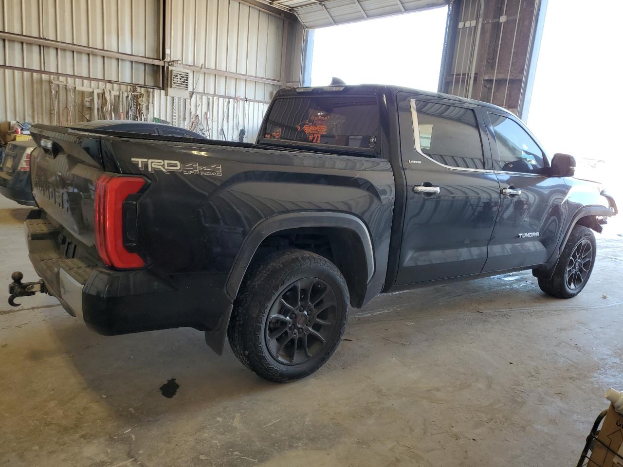 2023 Toyota Tundra VIN 5TFJC5DB4PX021097 Copart auction photo, front end / hail damage thumbnail 3