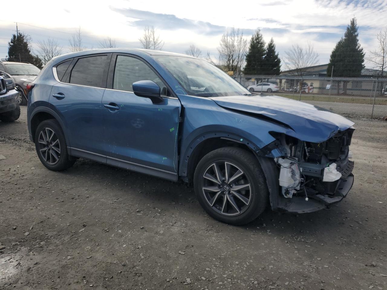2017 Mazda CX-5 VIN JM3KFADL3H0106950 Copart auction photo, front end damage thumbnail 4