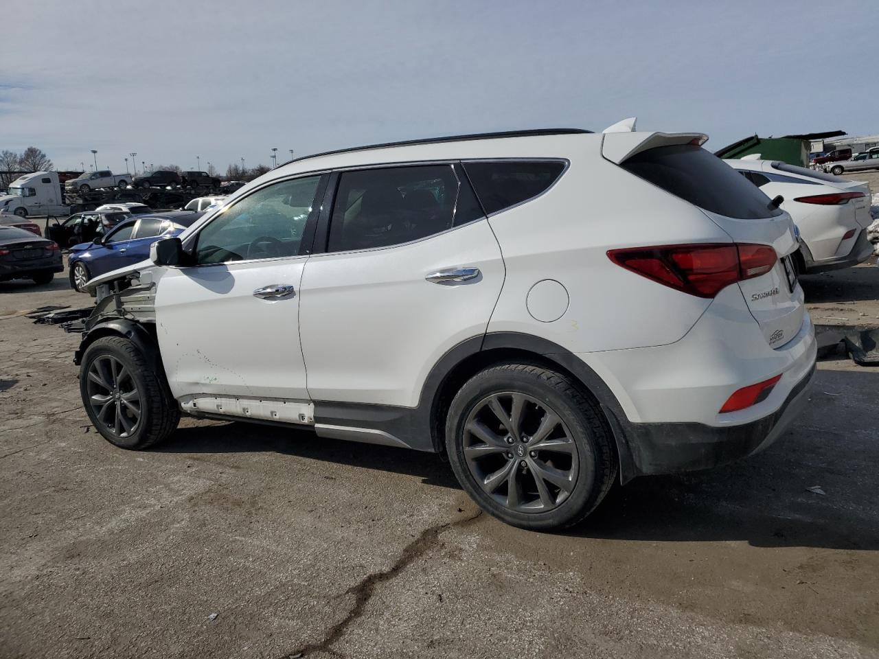 2018 Hyundai Santa Fe VIN 5XYZWDLA4JG566367 Copart auction photo, front end damage thumbnail 2