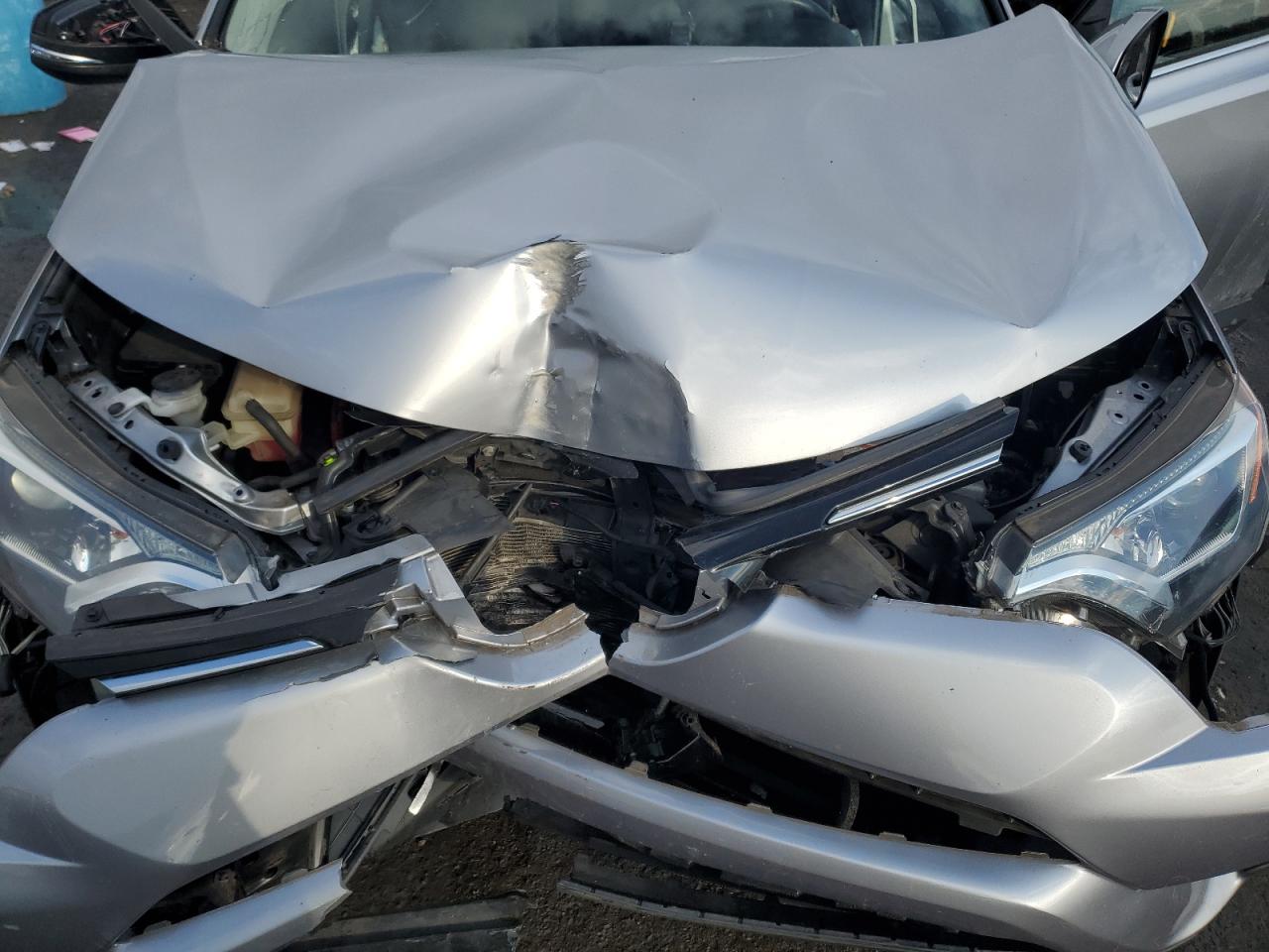2018 Toyota RAV 4 VIN JTMRJREV3JD238710 Copart auction photo, front end damage thumbnail 14
