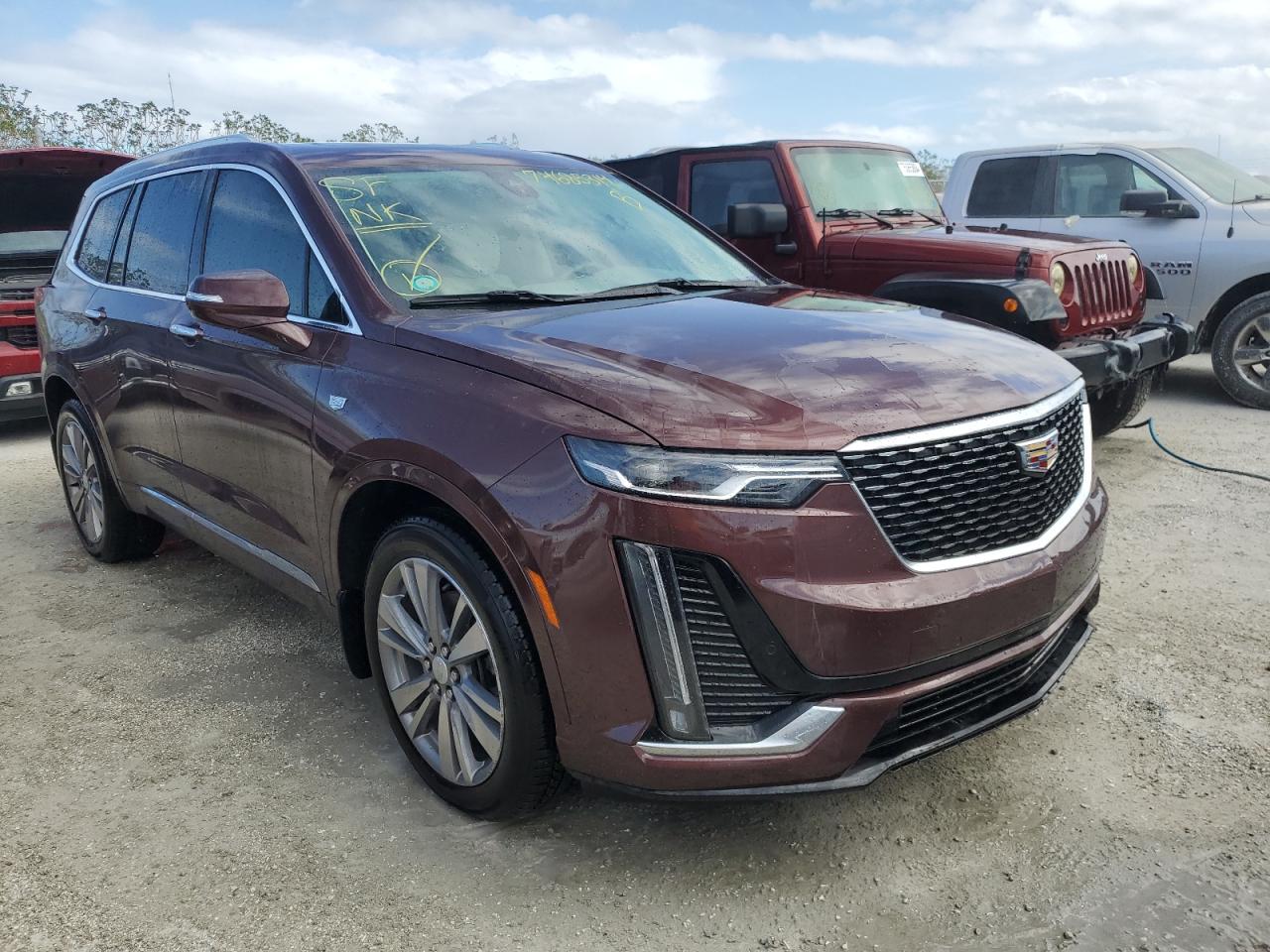 2022 Cadillac XT6 VIN 1GYKPCRS1NZ146012 Copart auction photo, water/flood damage thumbnail 4