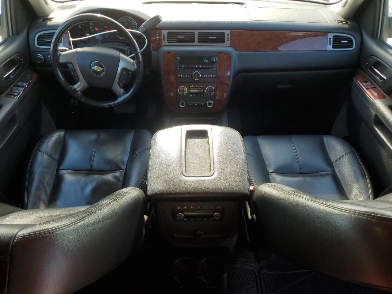 2012 Chevrolet Suburban VIN 1GNSKJE7XCR166063 Copart auction photo, vandalism damage thumbnail 8
