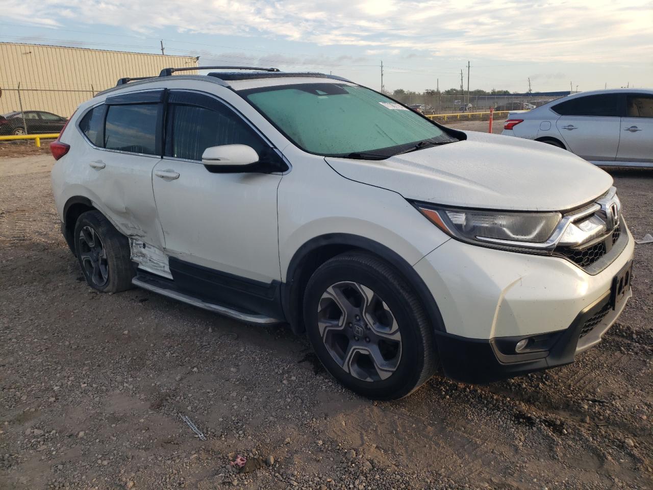2017 Honda CR-V VIN 2HKRW1H87HH507692 Copart auction photo, side / rear end damage thumbnail 4