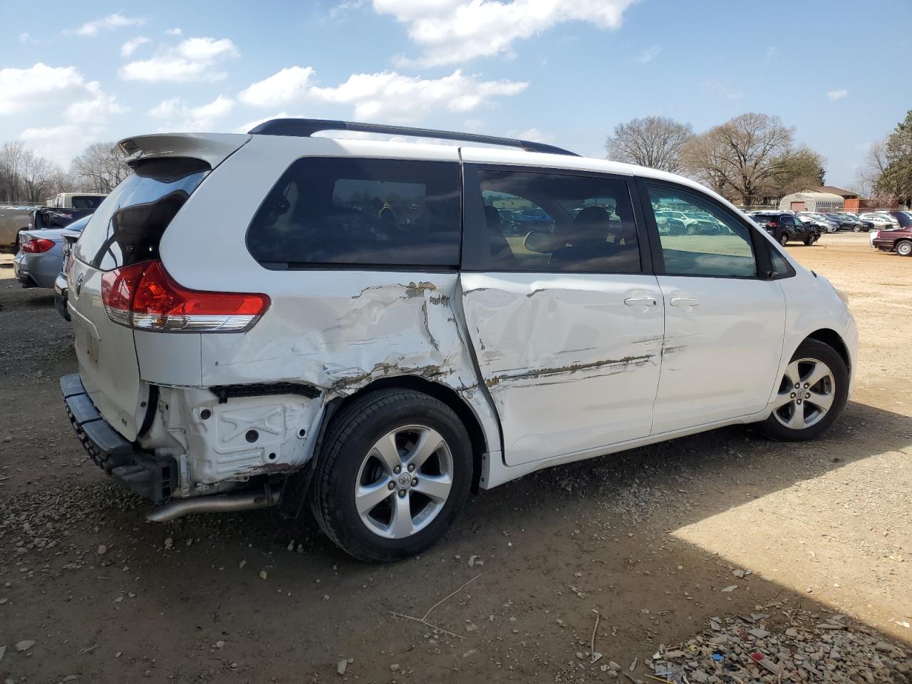 2011 Toyota Sienna VIN 5TDKK3DC1BS031184 Copart auction photo, side / rear end damage thumbnail 3