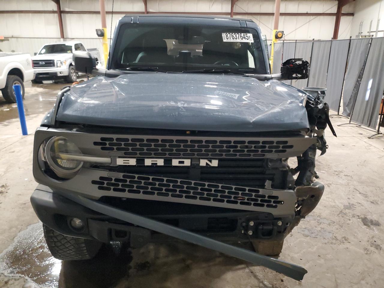 2023 Ford Bronco VIN 1FMEE5DP9PLB10786 Copart auction photo, front end / undercarriage damage thumbnail 5