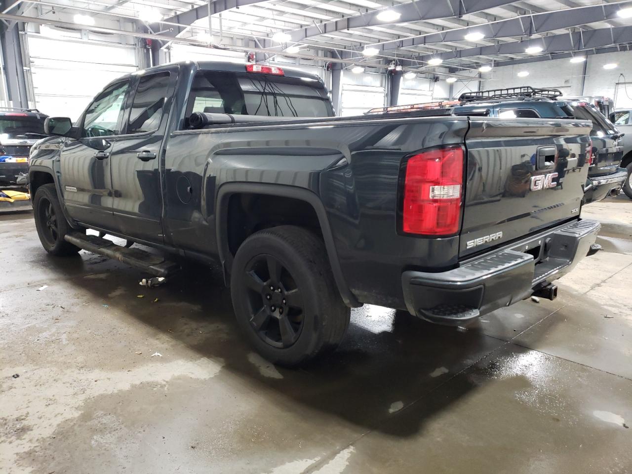 2017 GMC Sierra VIN 1GTV2MEC0HZ210065 Copart auction photo, front end / rear end damage thumbnail 2