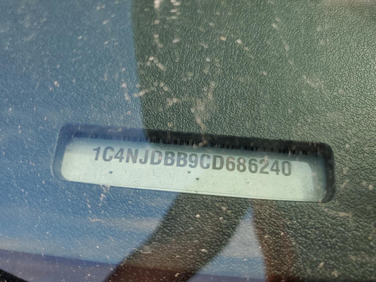 2012 Jeep Compass VIN 1C4NJDBB9CD686240 Copart auction photo, front end / rear end damage thumbnail 13