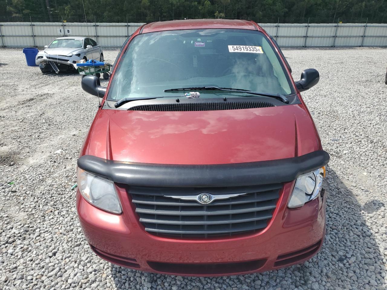 2006 Chrysler Town & Country VIN 1A4GP45R16B656630 Copart auction photo, front end / side damage thumbnail 5