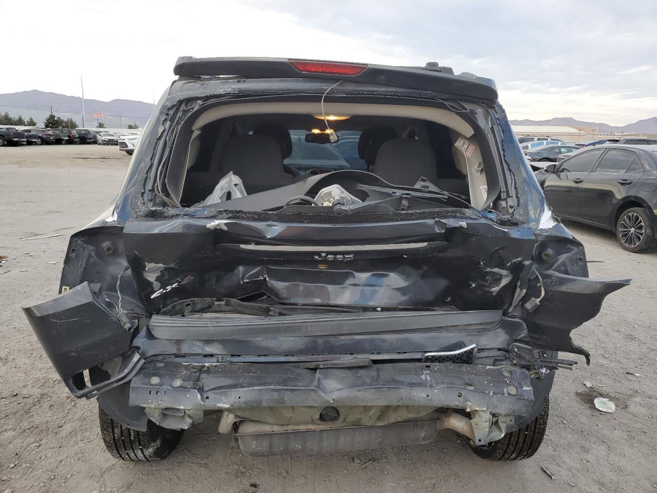 2016 Jeep Compass VIN 1C4NJDBB1GD520591 Copart auction photo, rear end damage thumbnail 6