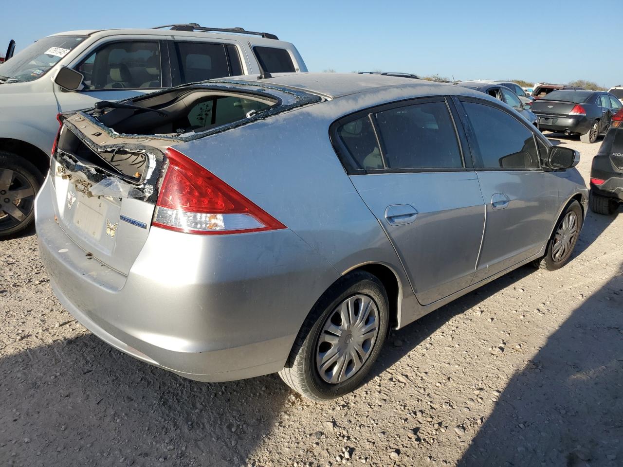 2010 Honda Insight VIN JHMZE2H54AS022186 Copart auction photo, rear end / minor dent/scratches damage thumbnail 3