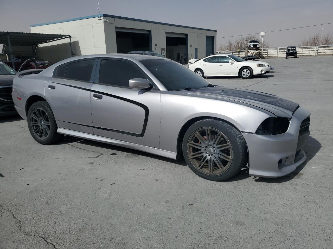 2013 Dodge Charger VIN 2C3CDXBG4DH609733 Copart auction photo, front end / minor dent/scratches damage thumbnail 4