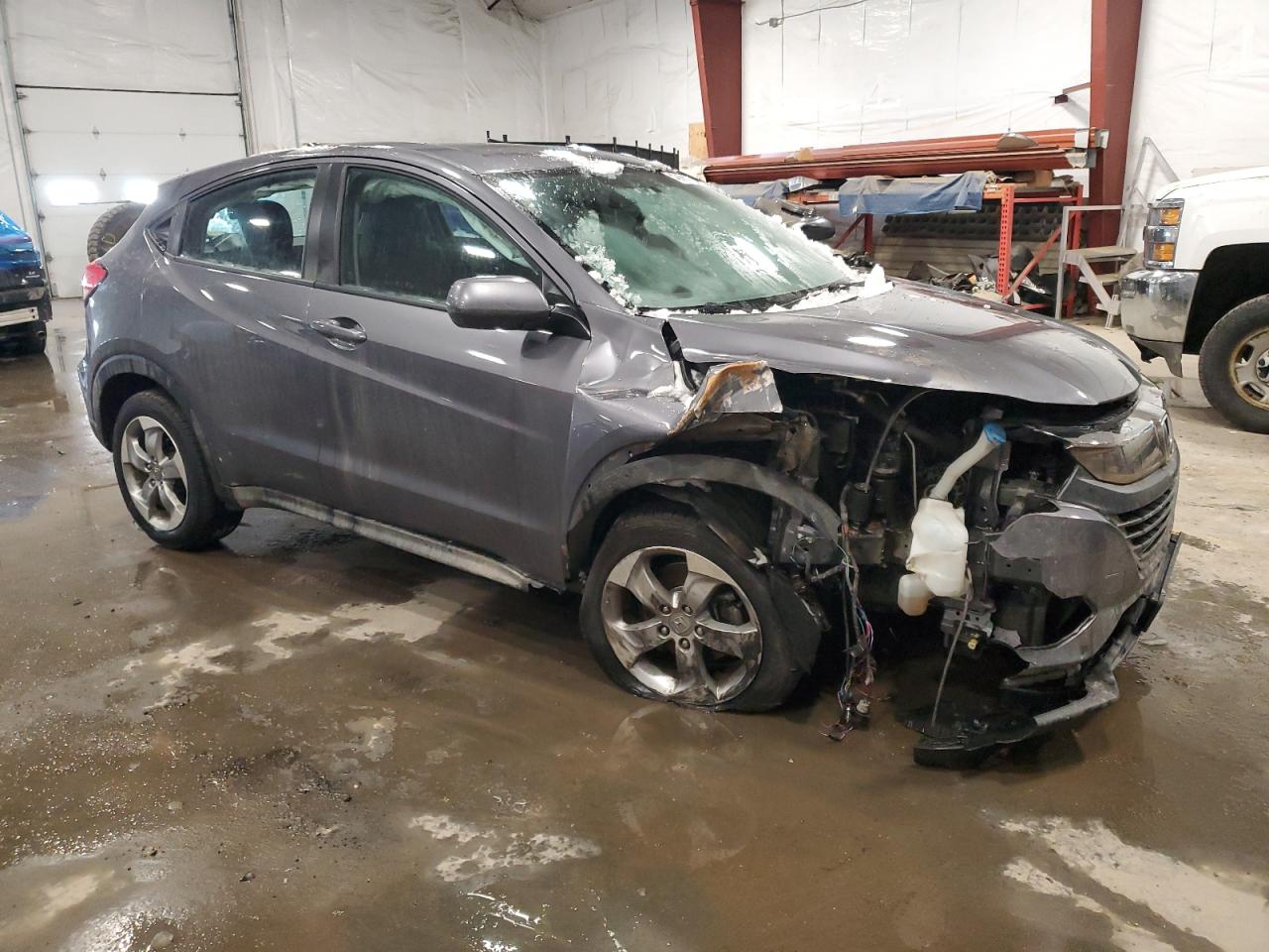 2019 Honda HR-V VIN 3CZRU6H39KG716160 Copart auction photo, front end / all over damage thumbnail 4
