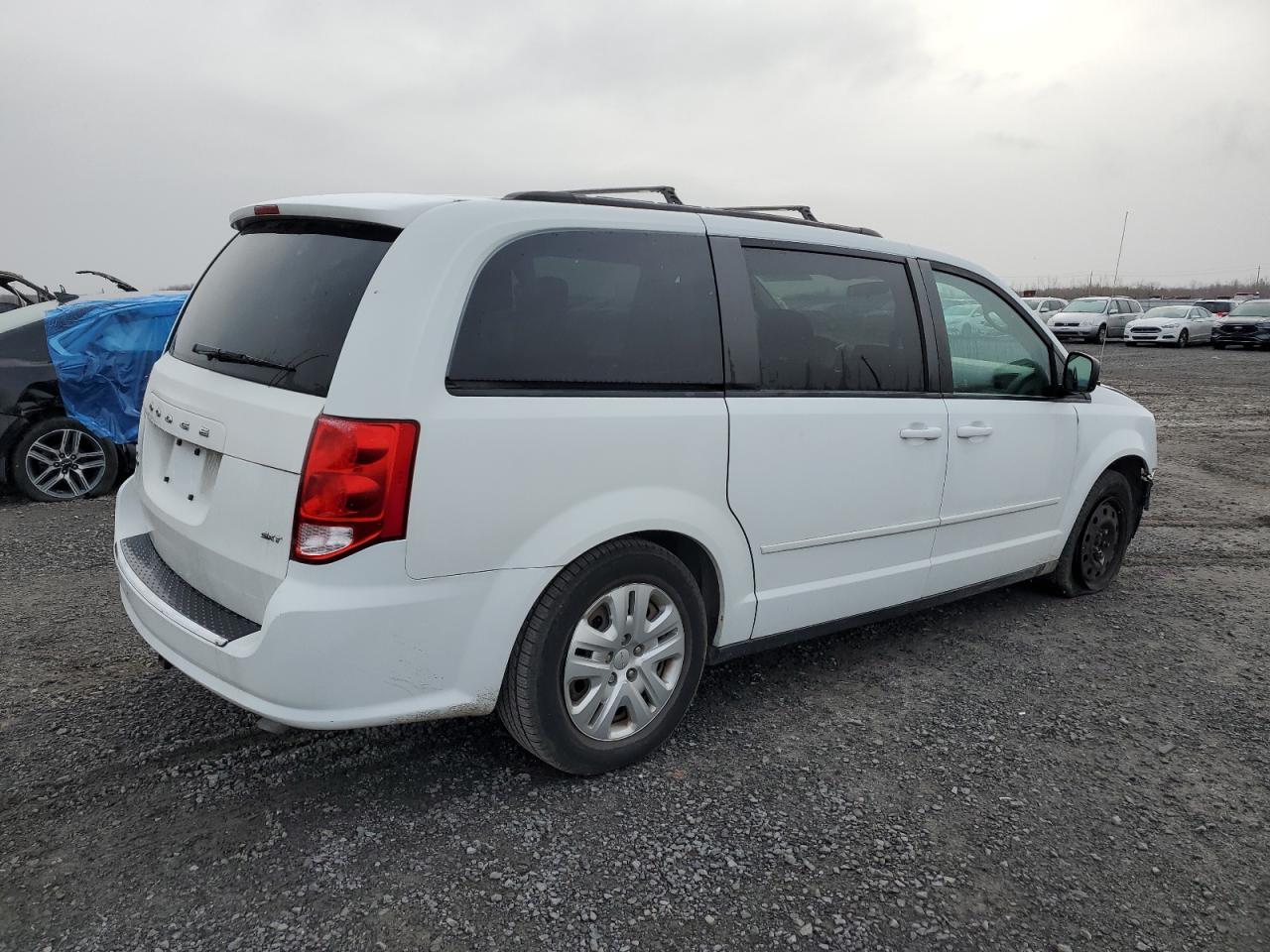 2016 Dodge Caravan VIN 2C4RDGBG1GR142744 Copart auction photo, front end / minor dent/scratches damage thumbnail 3