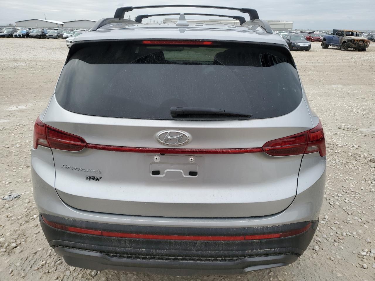 2023 Hyundai Santa Fe VIN 5NMS64AJ6PH525581 Copart auction photo, side damage thumbnail 6