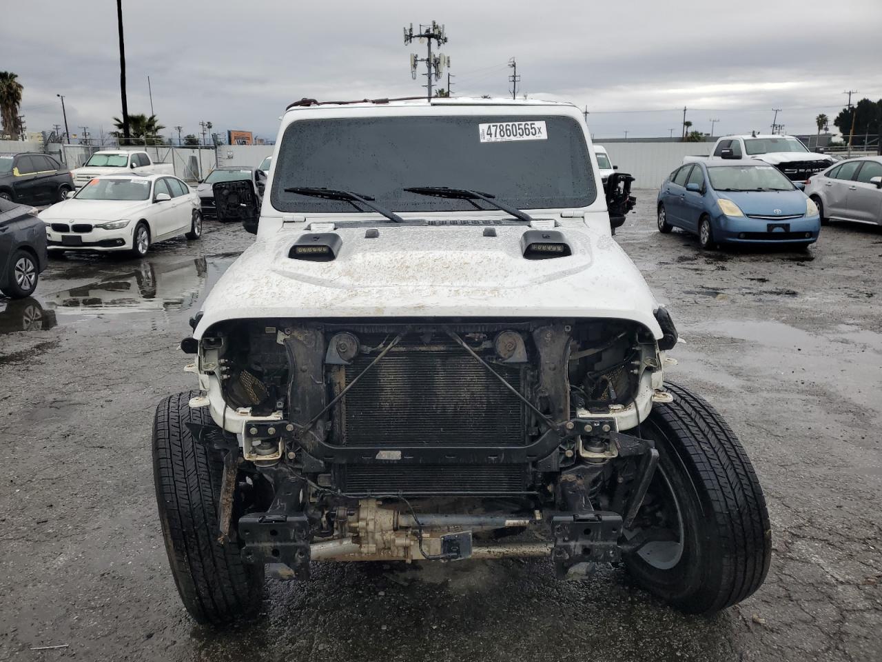 2021 Jeep Gladiator VIN 1C6JJTBM4ML556391 Copart auction photo, front end / undercarriage damage thumbnail 5